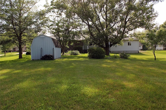 311 W View Dr, Osceola, IA 50213 - view of green lawn featuring a storage unit