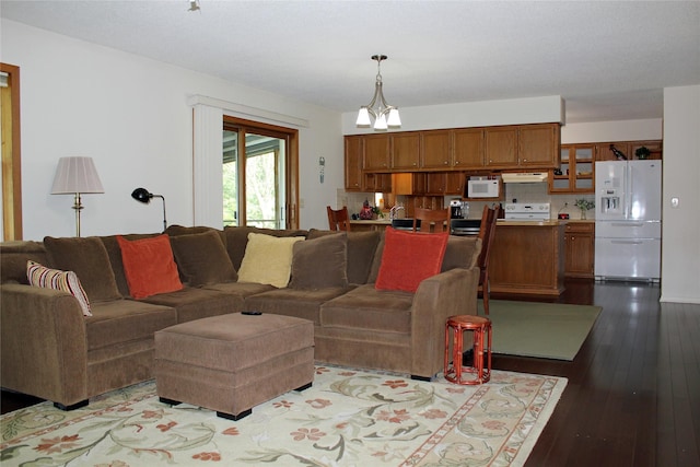 311 W View Dr, Osceola, IA 50213 - living room with hardwood / wood-style floors and a chandelier