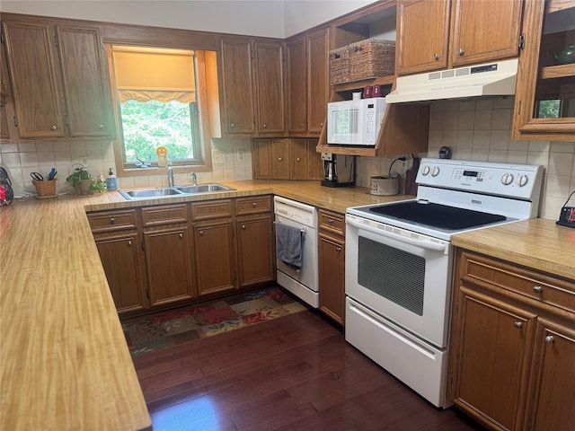 311 W View Dr, Osceola, IA 50213 - kitchen featuring white appliances, backsplash, under cabinet range hood, and light countertops