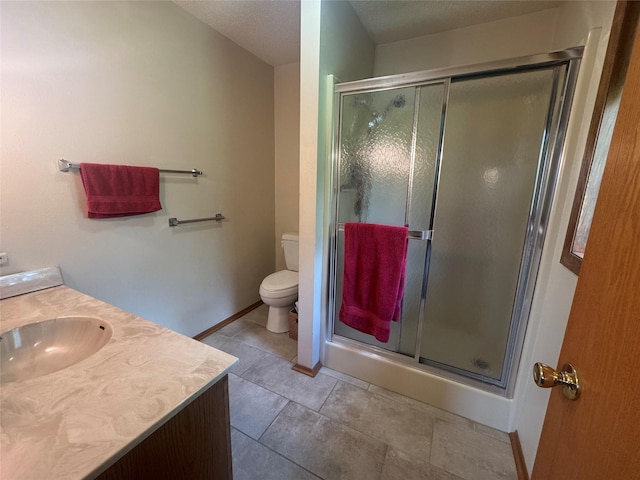 311 W View Dr, Osceola, IA 50213 - bathroom with vanity, a stall shower, and tile patterned flooring
