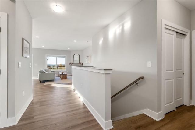 hallway with wood-type flooring