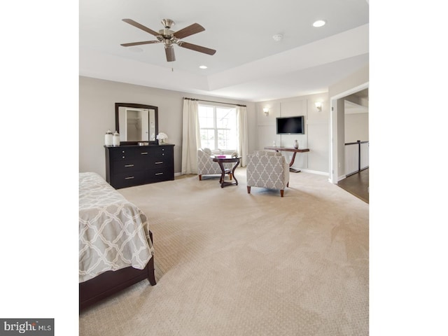 carpeted bedroom with ceiling fan