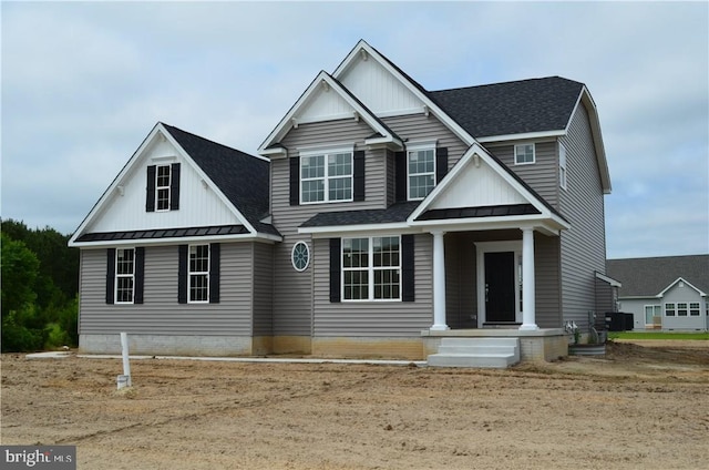 craftsman-style house with central AC