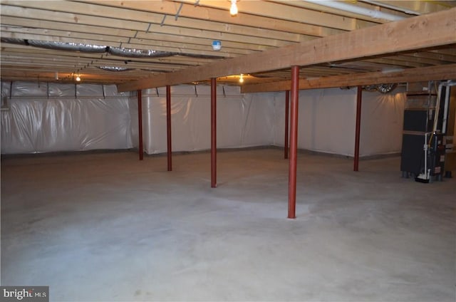 basement featuring heating unit