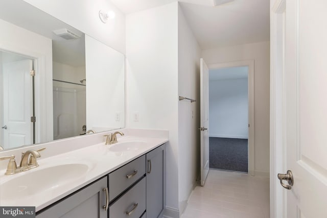 bathroom featuring vanity and tile patterned floors