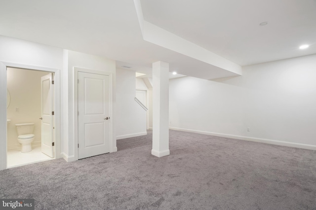 basement featuring carpet flooring