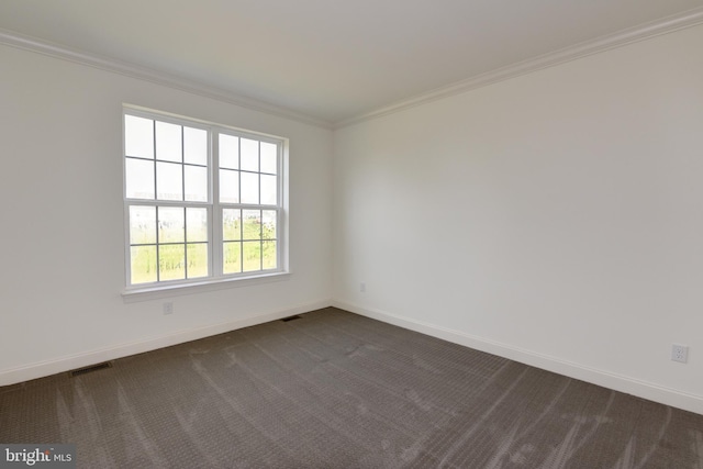 carpeted empty room with ornamental molding