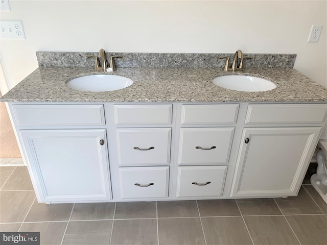 bathroom featuring vanity and tile patterned floors