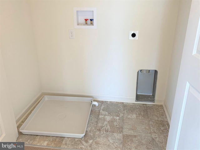 clothes washing area featuring electric dryer hookup and washer hookup