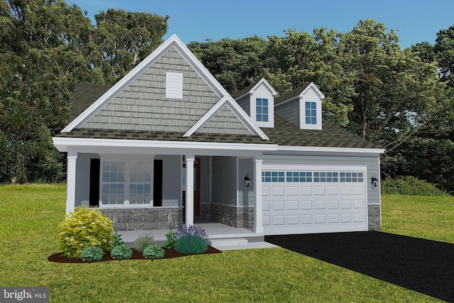 view of front of house with covered porch and a front lawn