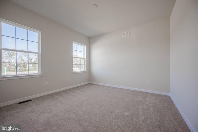 view of carpeted spare room