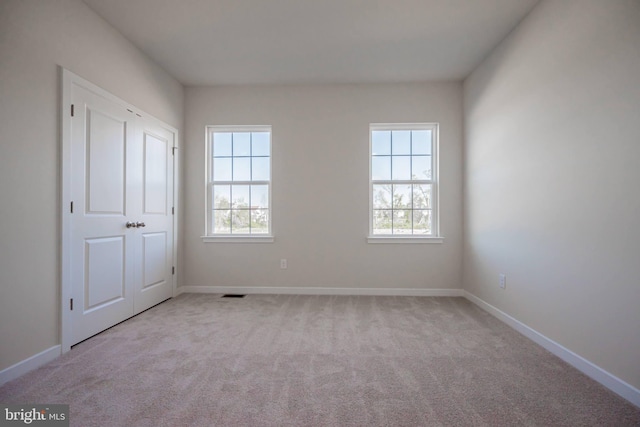 view of carpeted spare room