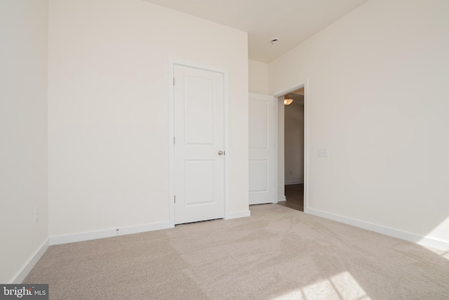 empty room with light carpet