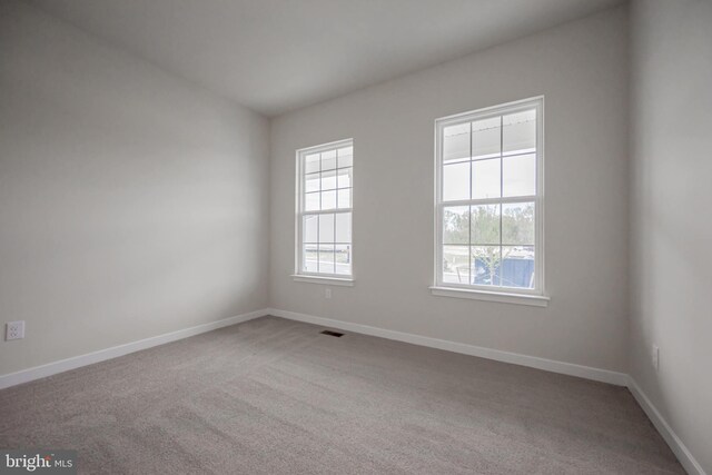 view of carpeted spare room