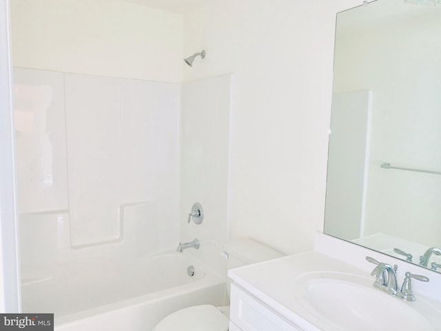 full bathroom with shower / tub combination, vanity, and toilet