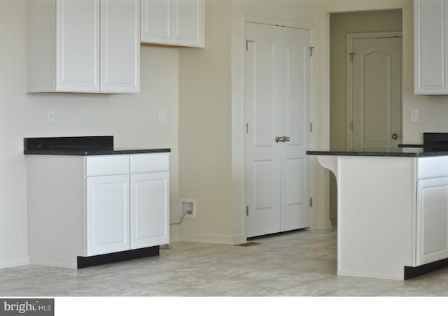 kitchen with white cabinetry