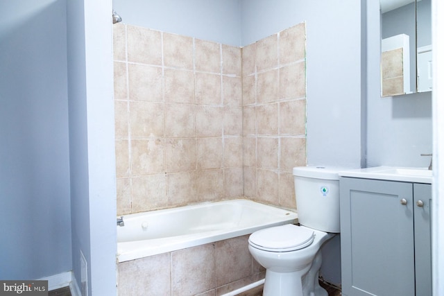 bathroom featuring vanity and tiled shower / bath