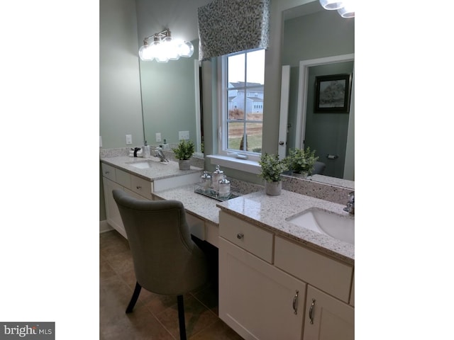 bathroom featuring tile patterned floors and vanity