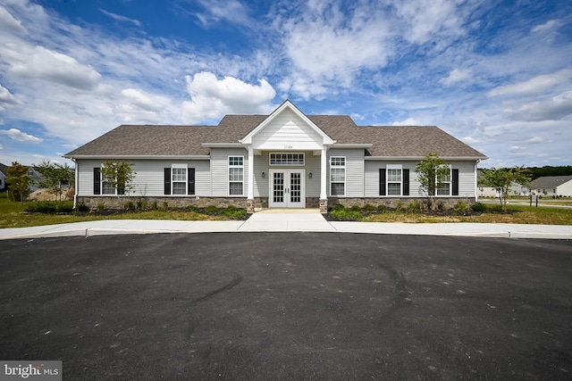 craftsman house featuring french doors