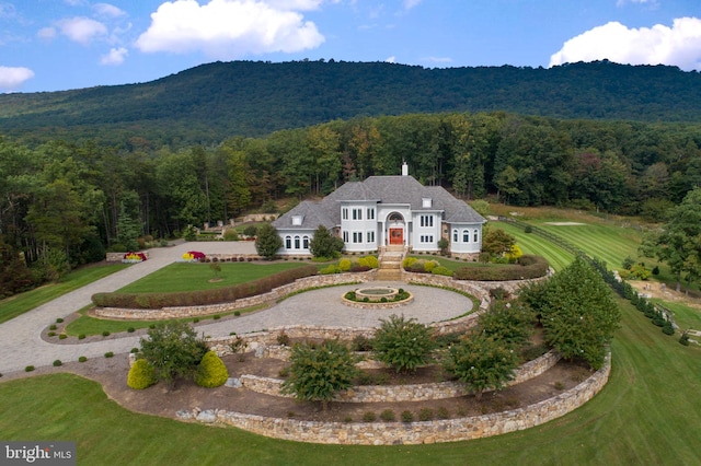 exterior space featuring a mountain view