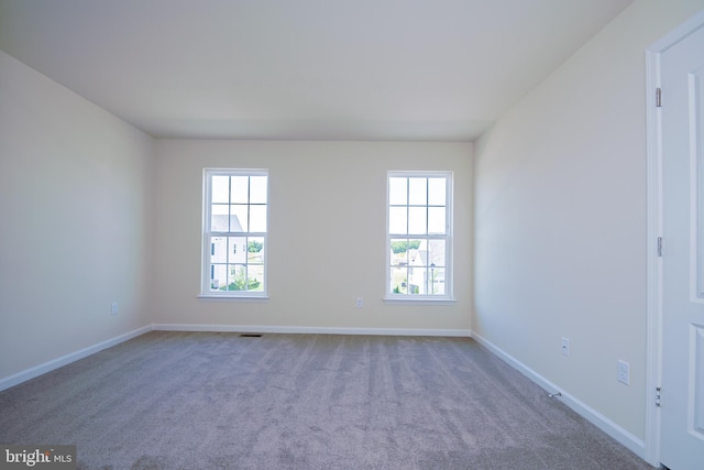 view of carpeted spare room