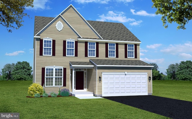 colonial home featuring a front lawn and a garage