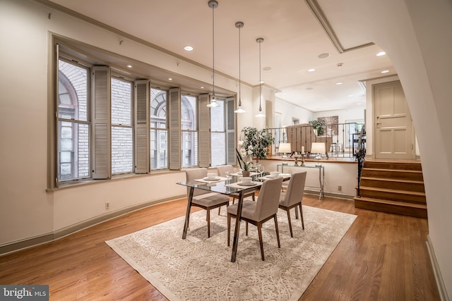 dining space featuring light wood-type flooring