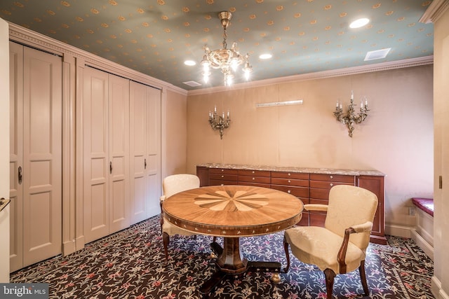 dining room featuring carpet flooring, an inviting chandelier, and ornamental molding