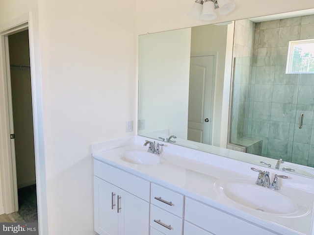 bathroom with vanity and walk in shower