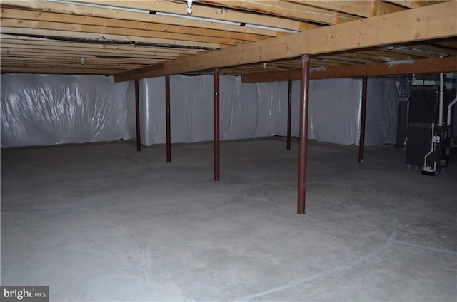 basement featuring heating unit