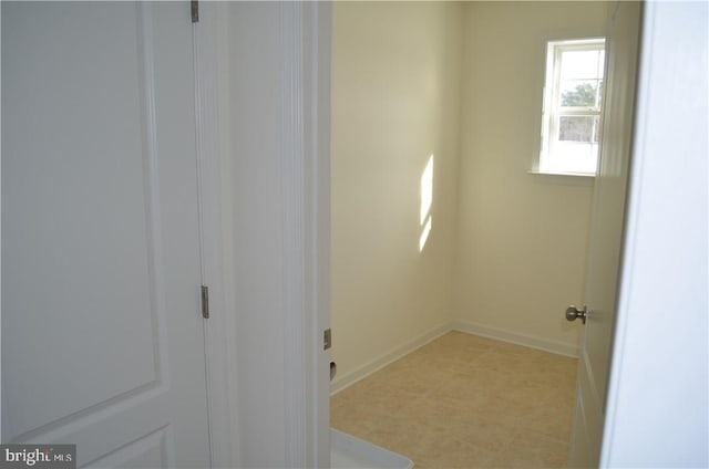 interior space with light tile patterned floors