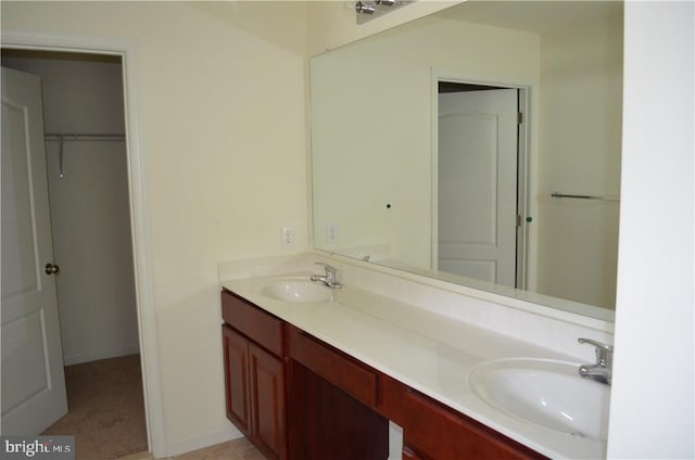 bathroom with dual vanity