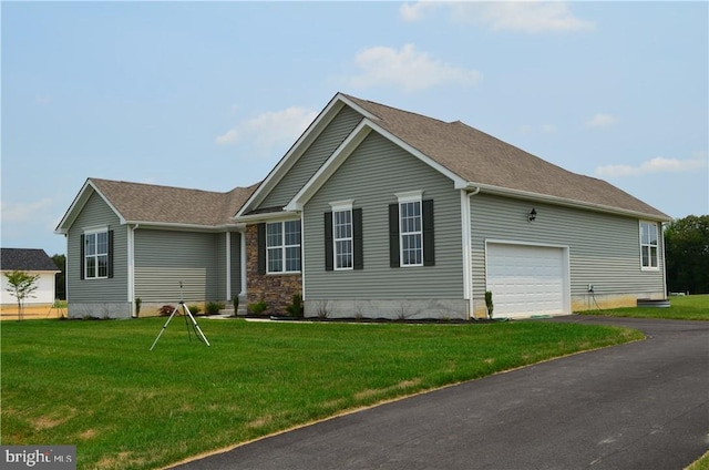 view of home's exterior with a yard and a garage