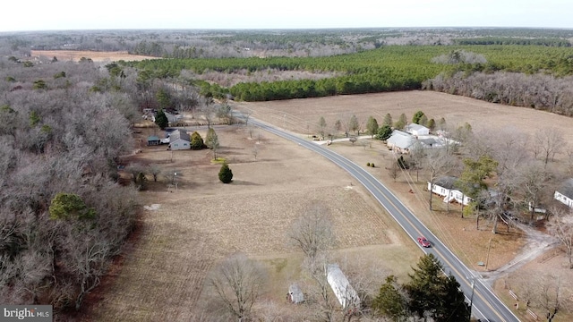 birds eye view of property featuring a rural view