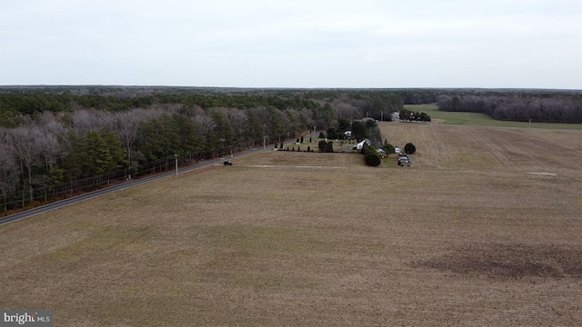 birds eye view of property with a rural view