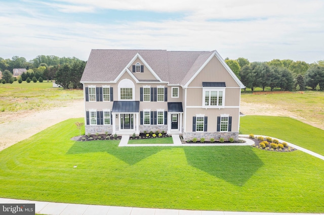 view of front of home with a front yard