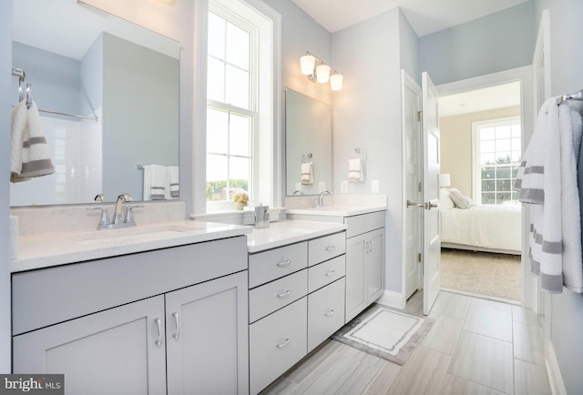 bathroom featuring vanity and plenty of natural light