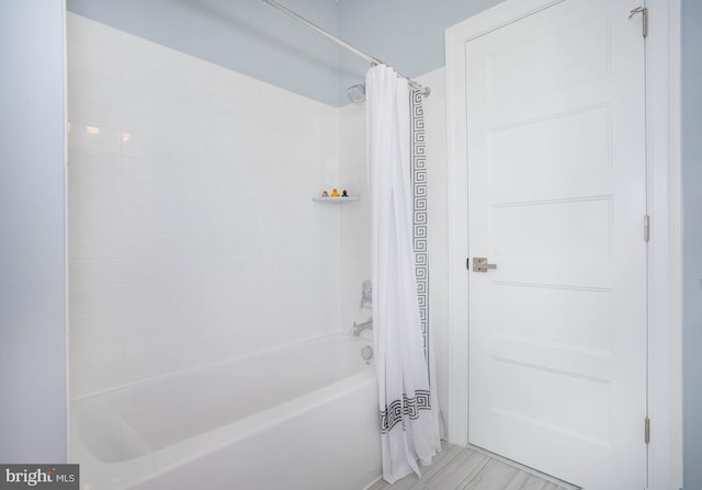 bathroom featuring shower / bath combination with curtain