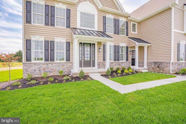 view of front facade with a front lawn