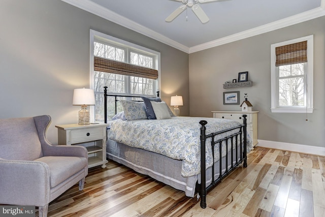 3621 Edgemont St, Edgewater, MD 21037 - bedroom featuring ornamental molding, light wood-type flooring, and ceiling fan