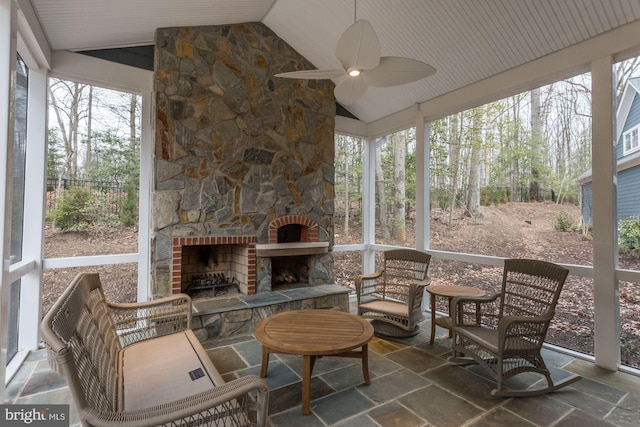 3621 Edgemont St, Edgewater, MD 21037 - sunroom featuring an outdoor stone fireplace, vaulted ceiling, and a ceiling fan
