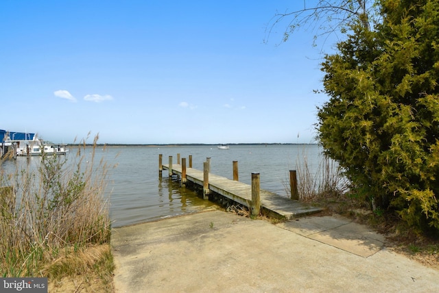 view of dock with a water view