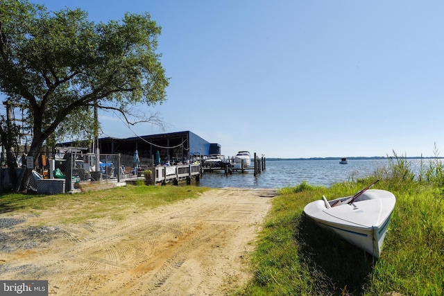 dock area with a water view