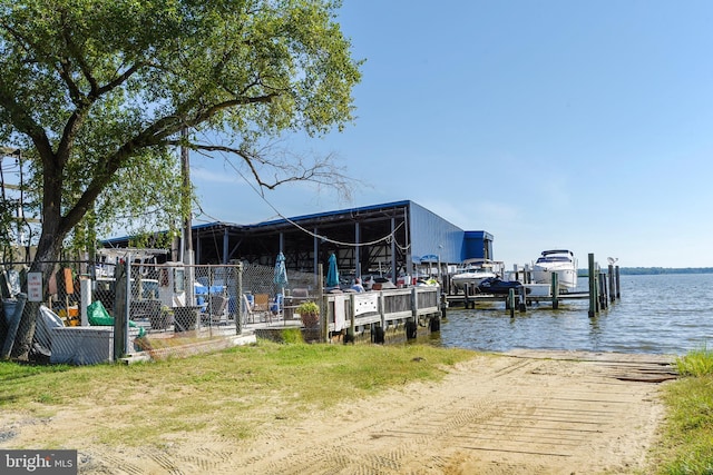 dock area with a water view