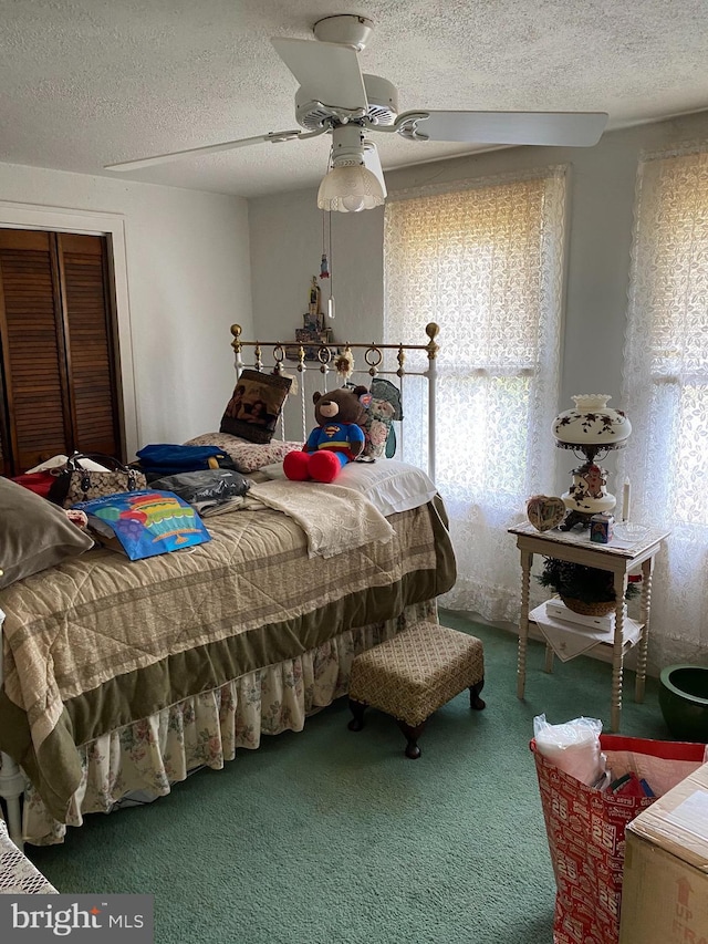 1457 W Landis Ave, Vineland, NJ 08360 - bedroom with carpet flooring, ceiling fan, and a textured ceiling