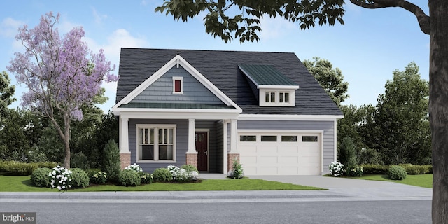 craftsman-style home featuring a front lawn and a garage