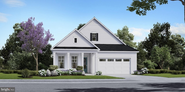 view of front of house with a front lawn and a garage