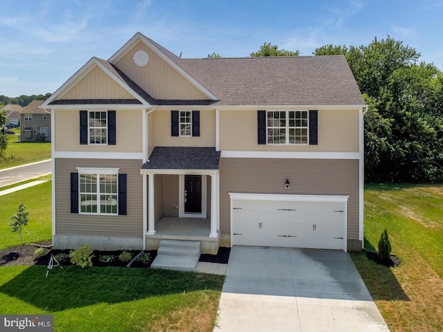 view of front facade featuring a garage and a front yard