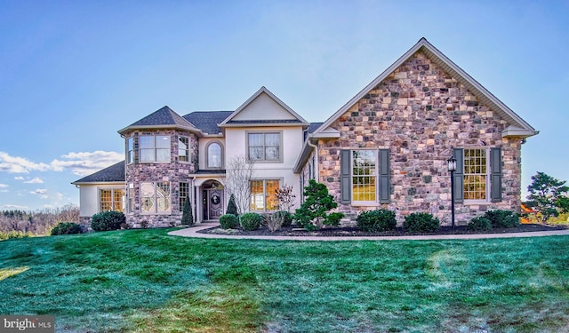 view of front facade with a front lawn