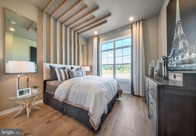 bedroom featuring light wood-type flooring